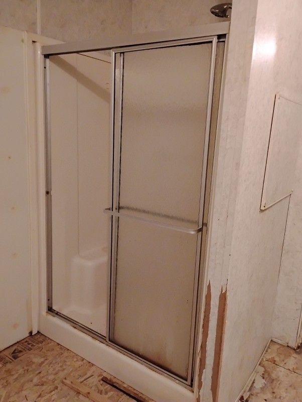 Stand. Up Shower 4x3 With Seats In It And Two Of Las Doors App Complete