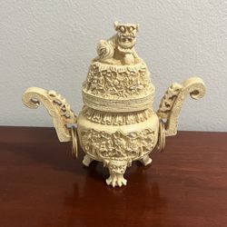 Vintage carved resin Chinese-style incense burner with foo dog lid and handles.