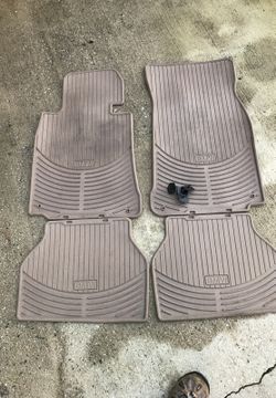 OEM BMW rubber mats for E 39 and various other models With stay in place clips