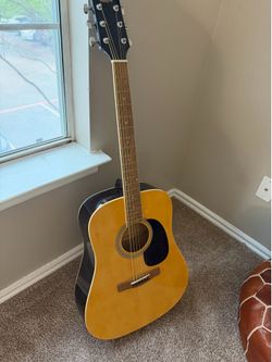 New - Rogue acoustic guitar