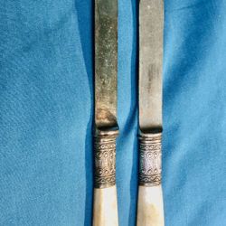 Sterling silver and mother of pearl butter knives, the pair