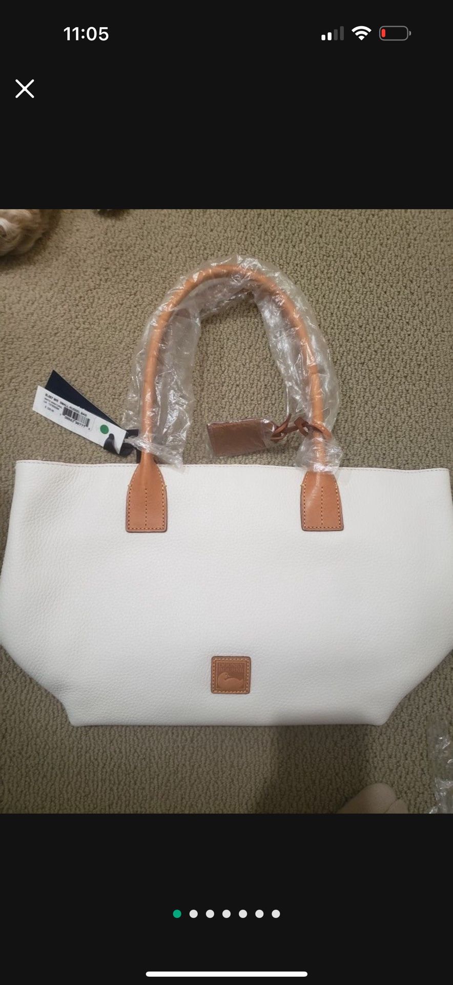 New with tag. Dooney & Bourke Russel Leather bag