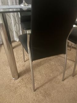 Glass Top Dining Table with leather chair