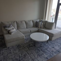 SOFA WITH COFFEE TABLE AND CARPET 