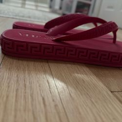 Pink Versace flip-flops