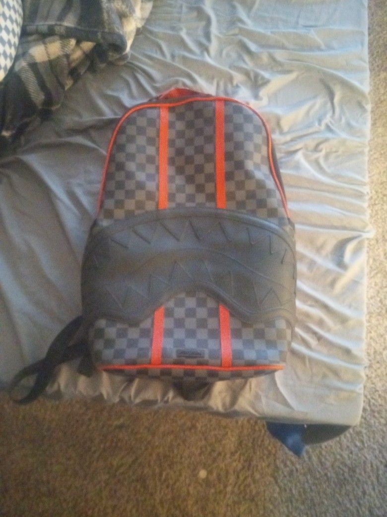 Red And Black Sprayground Backpack