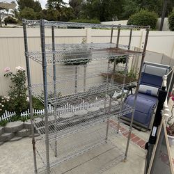 Heavy duty metal storage shelves.