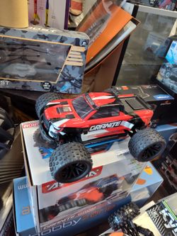 ARRMA Granite Grom brushed electric ready to run including remote controller battery and a charger