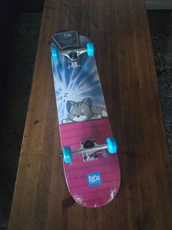 New ReDo Sleeping cat skateboard sold AS IS (has a very small dent on the top part )