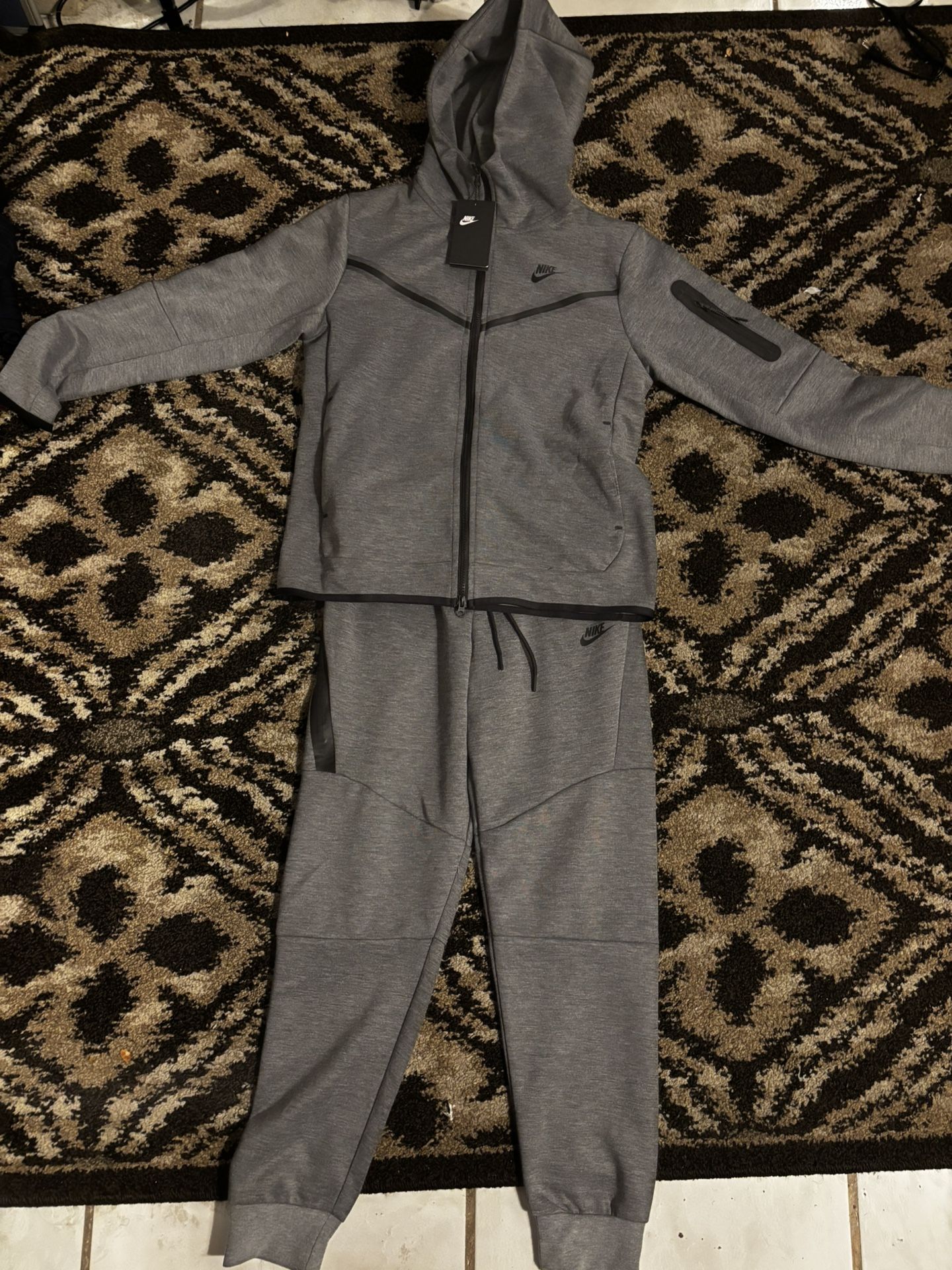 Grey Nike tech fleece hoodie and tracksuit bottoms