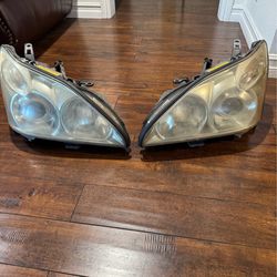 Lexus Rx330 Rx350 Rx400H oem Hid xenon headlamps headlights  $300 each including ballast and Harness
