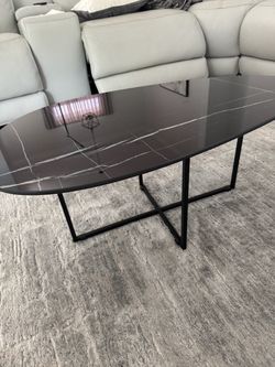 Two small coffee tables