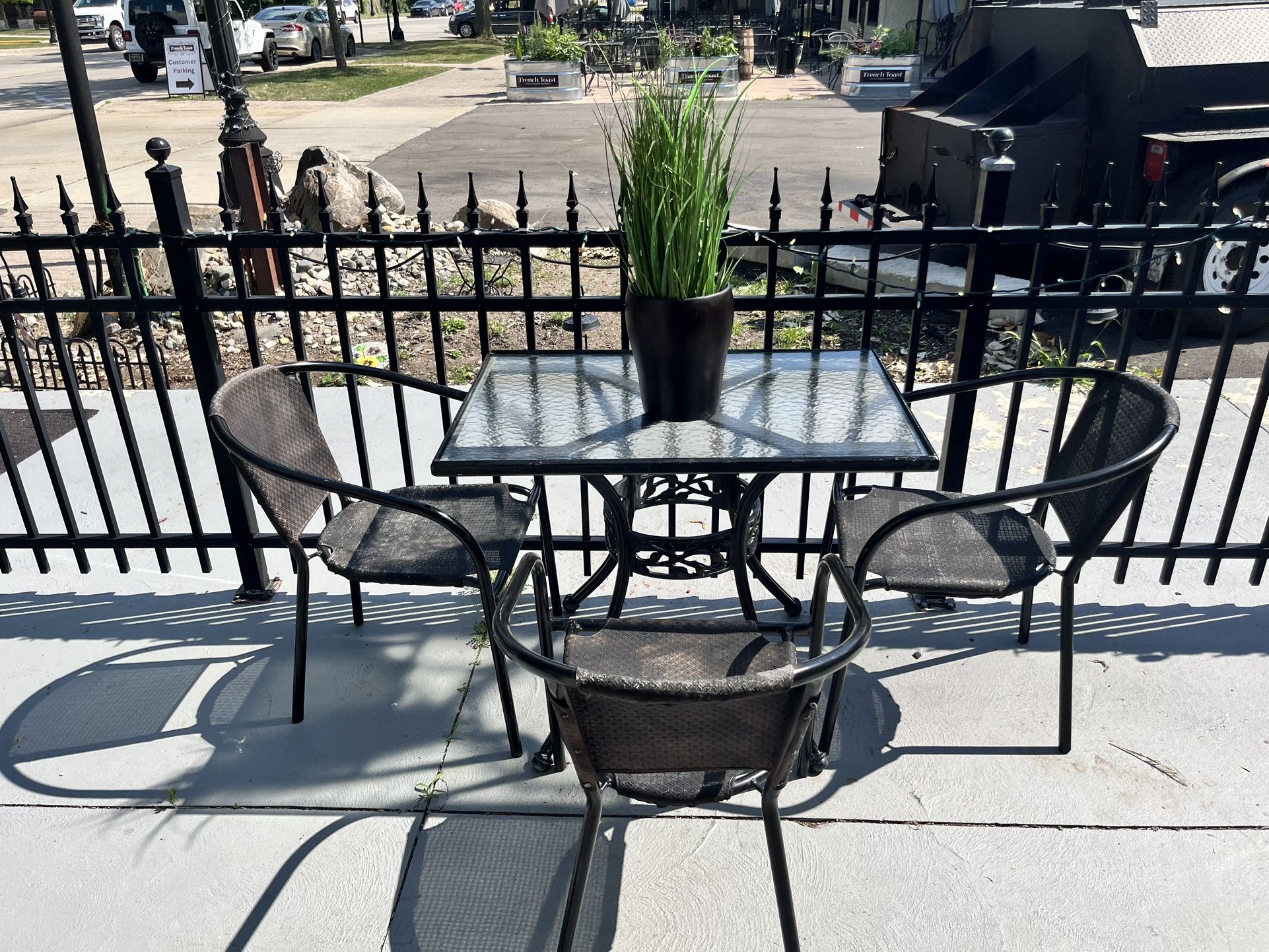 4 Piece of Glass table/ With 3 mesh chairs (2 Available)