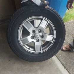 Jeep spare tire and Uhaul tow hitch