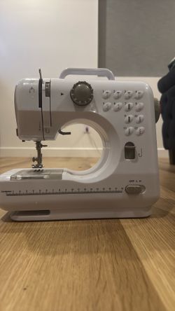 Sewing machine ( white )