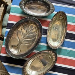 Antique silver platters (4)