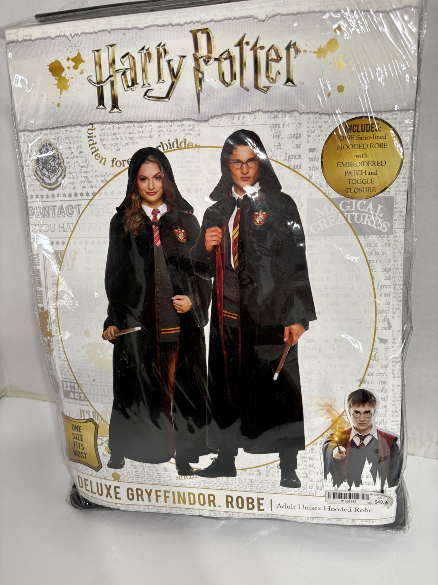 Harry Potter Deluxe Gryffindor Robe One Size Adult Unisex Hooded Robe $50 retails, one satin lined hooded robe, with embroidered patch and toggle clos