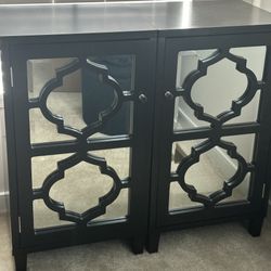 Two Wooden Cabinets With Mirrored Front