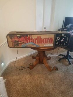 Marlboro hanging sign with clock