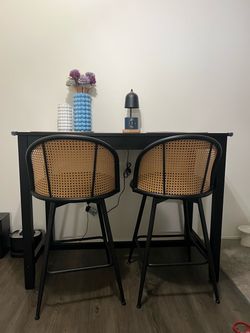 Table and Swivel Chairs