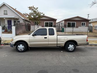 2002 Toyota tacoma extra cab 4 cylinder automatic transmission runs great power windows / locks cruise control new tires new brakes new shocks cold AC
