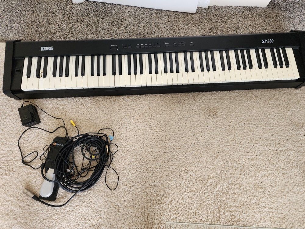 KORG SP-100 Piano Full Size With Carrying Case.