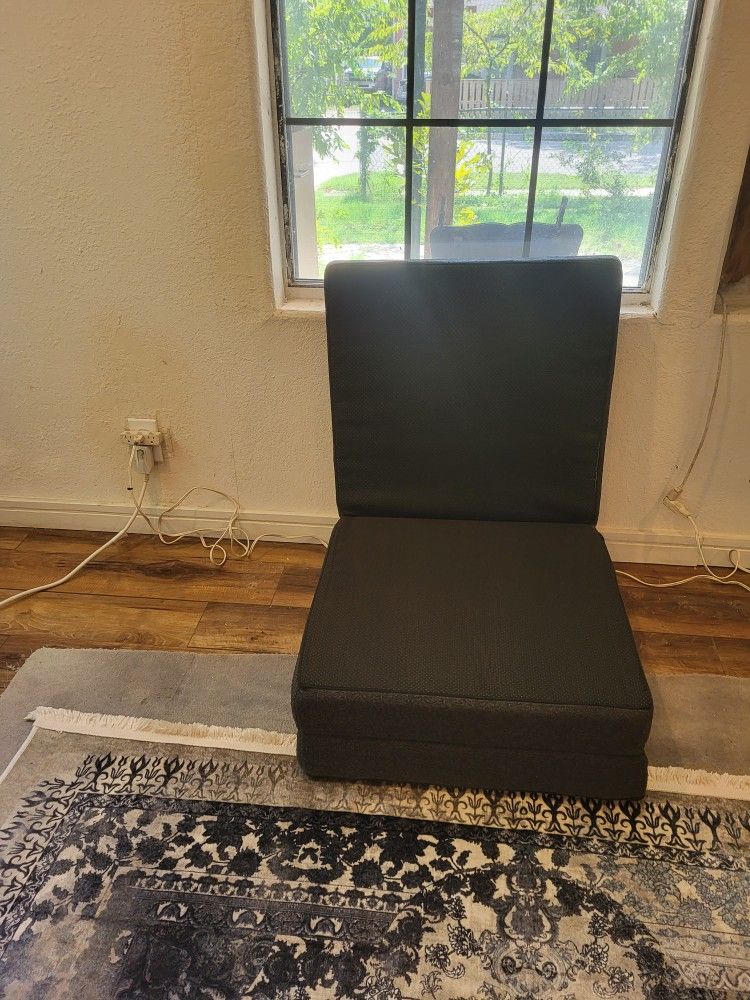 Comfortable and practical foldable bed that turns into a very comfortable chair and ottoman