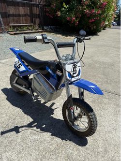 Electric razor dirt bike