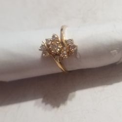 14K  Gold diamond ring size 7 and a 1/2