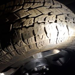 Four tires with rims tire brand Toyo