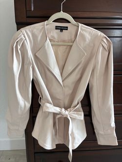 Beautiful Catherine Malandrino jacket in a soft ivory/cream color.