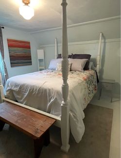 White Four-Poster Bed Frame and mattress