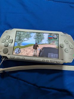 psp 1000 with over 70 games!