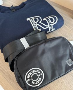 $25 Lululemon purse + Reformed Pilates Sweater