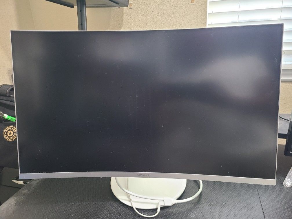 1-27" Dell Monitor And 1- 27" Curved Samsung Monitor