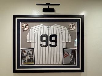 Aaron Judge #99 Autographed Pinstripe Yankees Jersey Framed By Fanatics