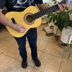 Professional small guitar for young people