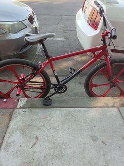 Red and Black BMX Bike with Mag Wheels
