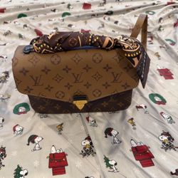 Louis Vuitton Pochette Métis