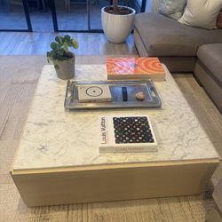Light wood and marble coffee table