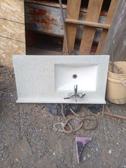 Vanity top and sink with faucet
