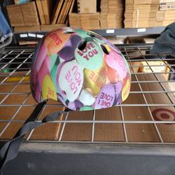 Young Girl Skateboards Helmet 