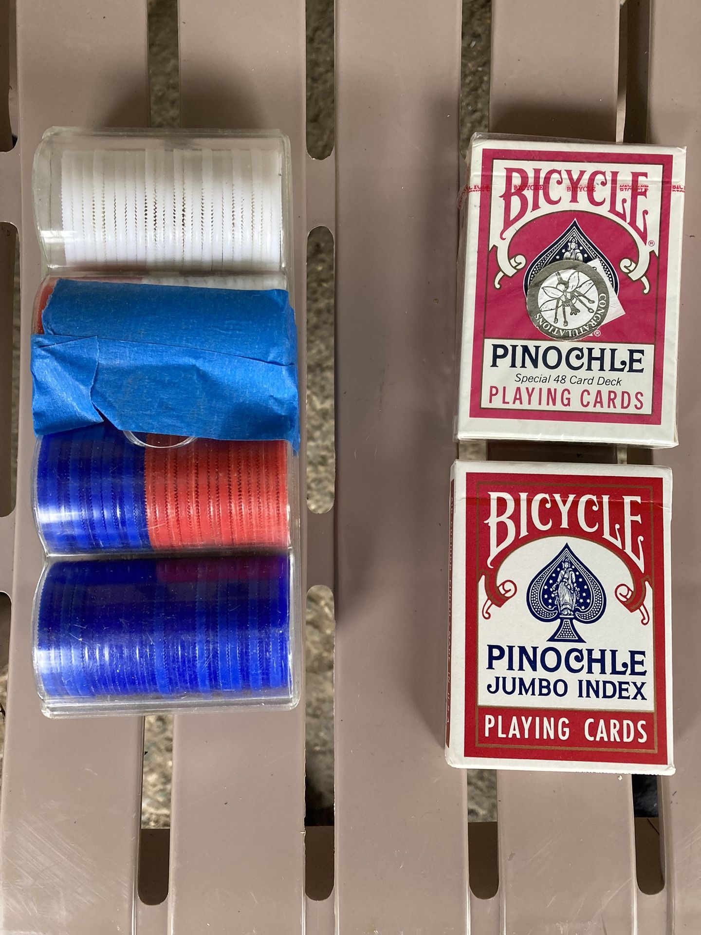 2 NEW DECKS OF PINOCHLE PLAYING CARDS AND CLEAR ROLL OF POKER CHIPS