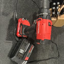 Craftsman hammer drill with one drillbit and charger