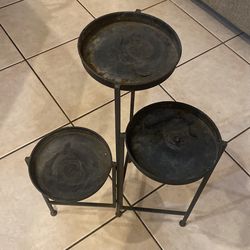 Black metal three tier plant stand