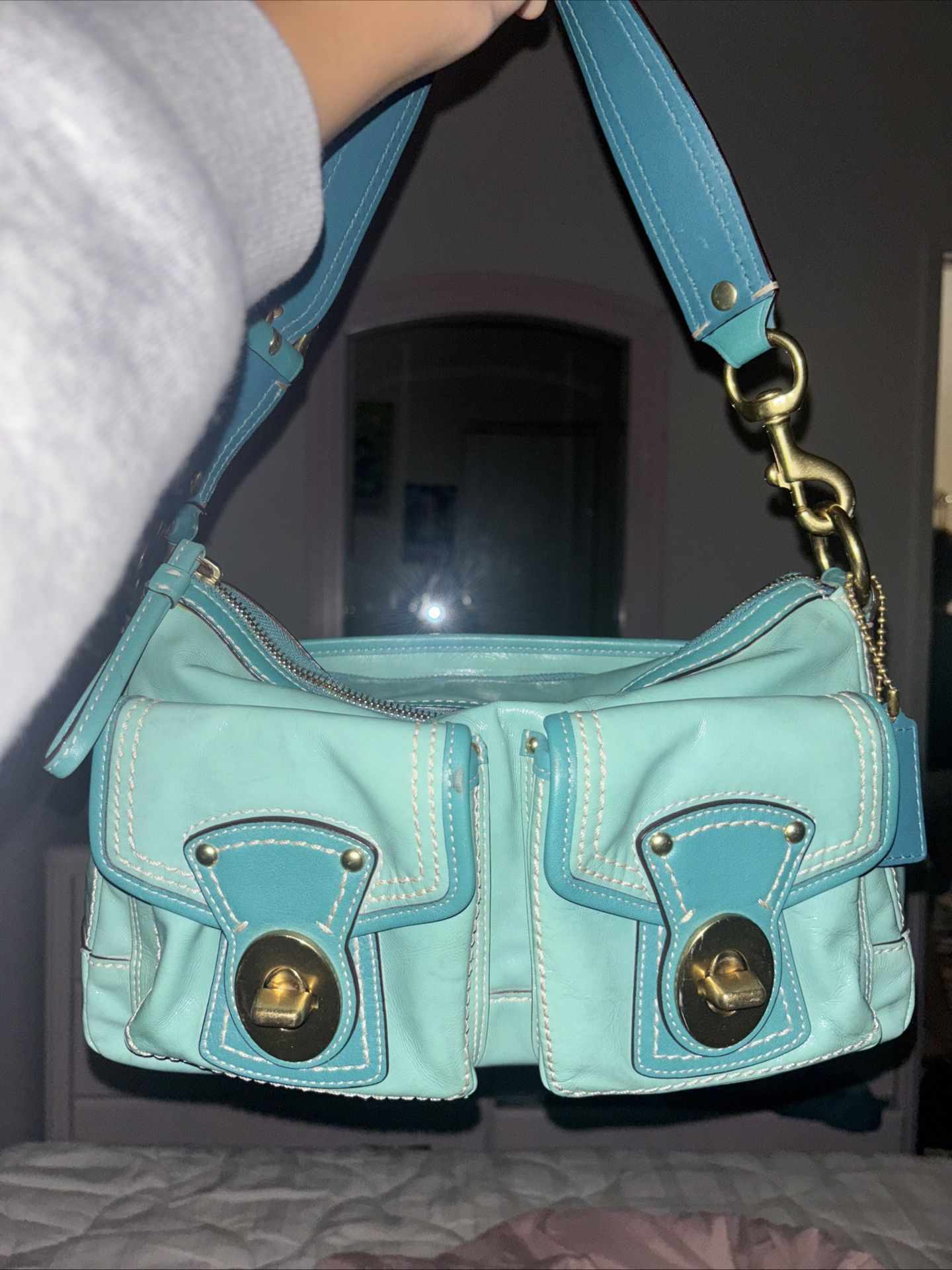 Coach Legacy 65th Anniversary Double Turnlock Shoulder Bag in a teal patent leather.