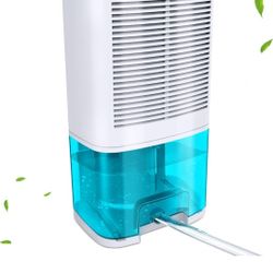 Dehumidifier 68oz(2000ml) Small Dehumidifier with
Drain Hose for Up to 650 sq.ft Ultra Quiet Mini Portable
Air Dehumidifier.. New