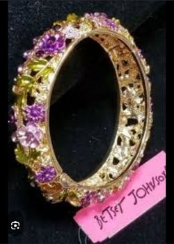 $45 BETSEY JOHNSON artisanal enamel cutout hinged bangle.