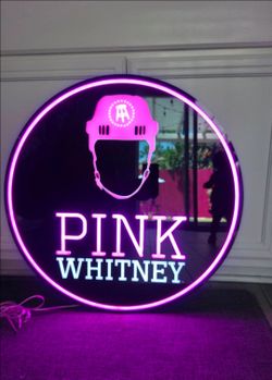 Pink Whitney neon sign
