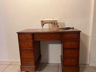 Sewing machine with desk